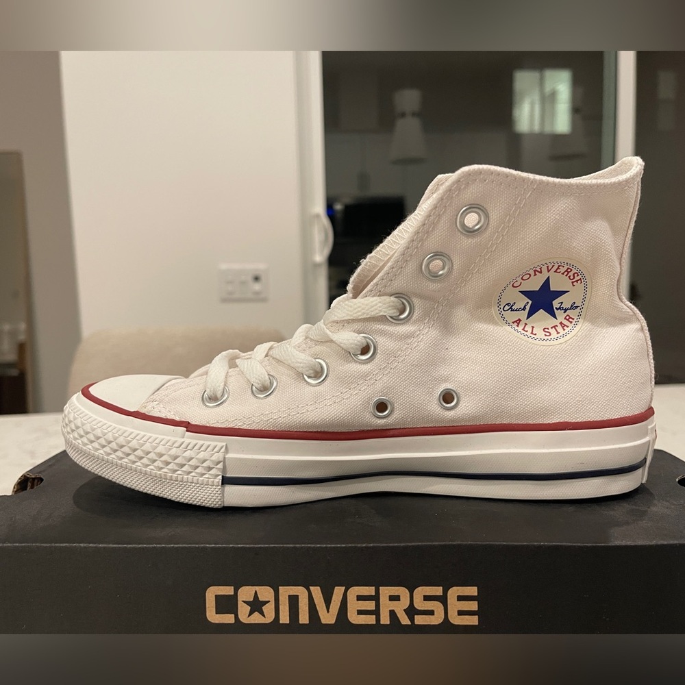 White converse high tops.